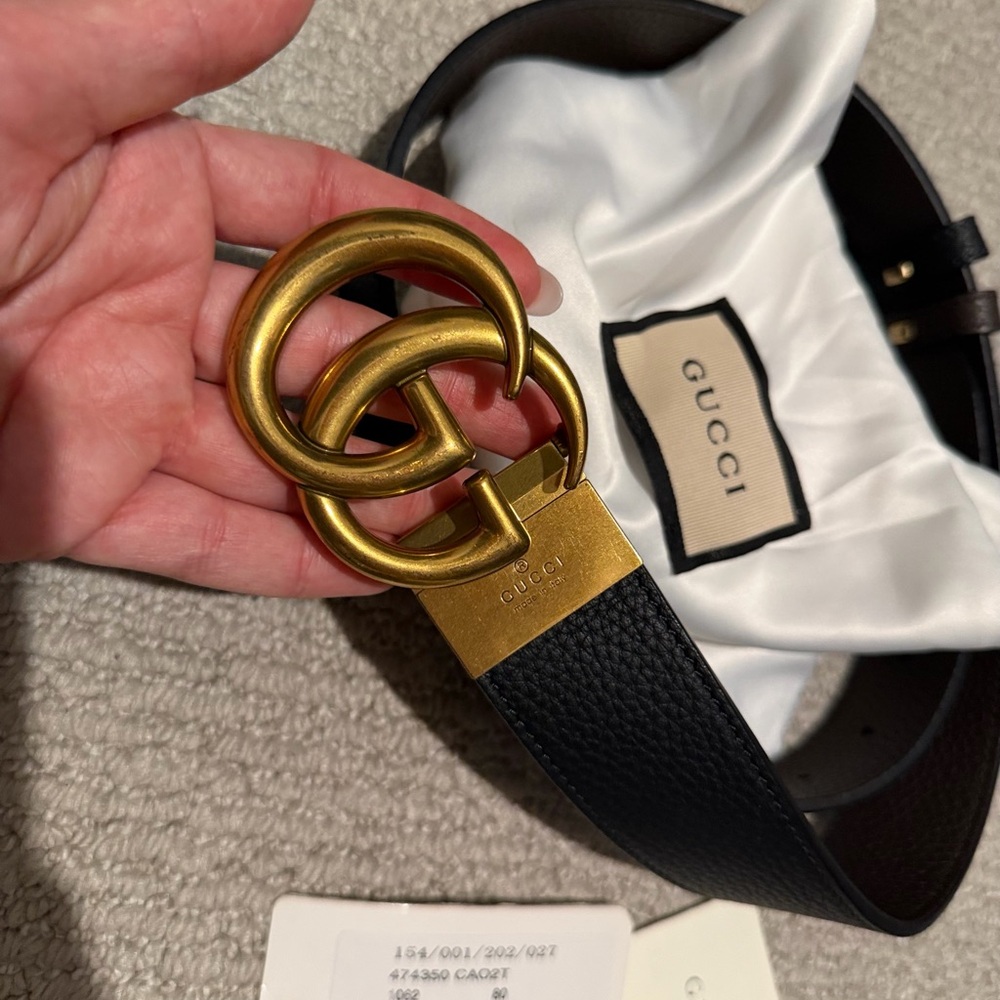 100% Authentic Gucci Black and Brown Leather Reversible Belt with Gold Buckle